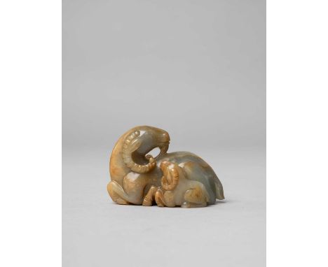 A CHINESE CELADON AND RUSSET JADE 'TWO RAMS' GROUPQING DYNASTY OR LATERDepicting a large recumbent ram with its head turned b