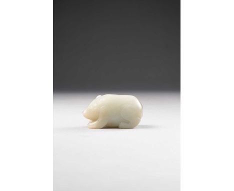 A CHINESE PALE CELADON JADE CARVING OF A BEARQING DYNASTY OR LATERCrouching with his head facing forward and legs tucked unde