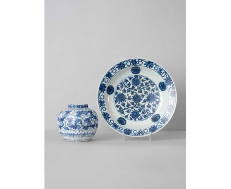 A CHINESE BLUE AND WHITE JAR AND A 'LOTUS' DISHMING DYNASTY AND PERHAPS LATERThe jar formed as a melon and painted with two s