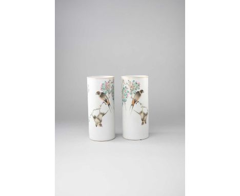 A PAIR OF CHINESE QIANJIANG-STYLE CYLINDRICAL VASESLATE QING DYNASTYEach painted with a swallow perched amongst blossoming fl