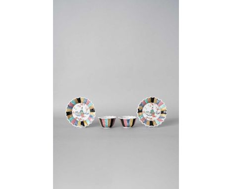 A PAIR OF CHINESE FAMILLE ROSE TEA BOWLS AND SAUCERS YONGZHENG/ EARLY QIANLONG  Each finely decorated to the centre with a ro