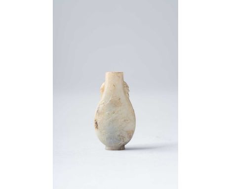 A SMALL CHINESE CELADON-GREY JADE SNUFF BOTTLE18TH/19TH CENTURYThe bottle of flattened pear-shape, carved with small lion-mas
