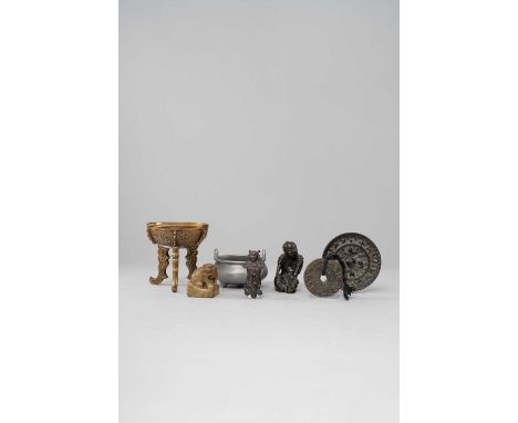 A SMALL COLLECTION OF CHINESE BRONZE ITEMSMOSTLY QING DYNASTYComprising: a circular pendant decorated with the twelve zodiac 