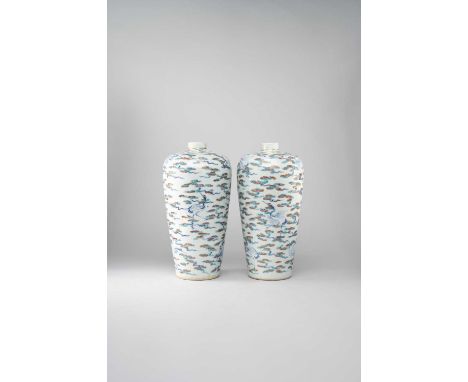 A PAIR OF CHINESE DOUCAI 'CRANE' VASES, MEIPINGQING DYNASTYEach vase painted with nine cranes in flight amongst colourful ruy