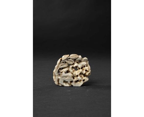 A CHINESE GREY JADE 'DEER' GROUPQING DYNASTY OR LATERCarved in openwork depicting two deer resting on craggy rocks beneath a 