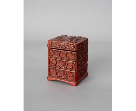 A CHINESE CINNABAR LACQUER THREE-TIERED BOX AND COVERLATE MING DYNASTYOf square section with chamfered corners, the cover car