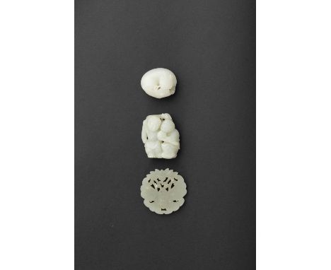 THREE CHINESE WHITE AND CELADON JADE ITEMSQING DYNASTY OR LATEROne carved as a cat and a butterfly, another of the Hehe Erxia