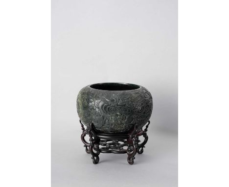 A LARGE CHINESE SPINACH-GREEN JADE 'DRAGON' BRUSH WASHER19TH CENTURYThe exterior carved in relief with four scaly dragons wri