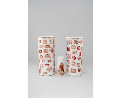 A PAIR OF CHINESE IRON-RED CYLINDRICAL VASES QING DYNASTY AND LATER  Each decorated with stylised seal marks, the bases with 
