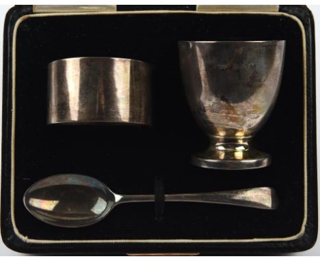 Cased 3 piece silver christening set comprising of an egg cup bears inscription 'to Timothy Oliver from Godfather Jan 18th 19