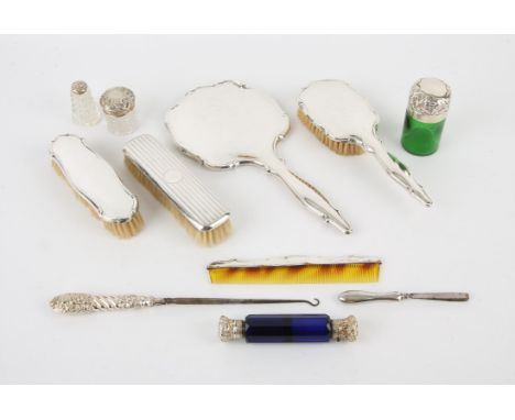 German sterling silver brush, mirror and comb set, clothes brush, green glass jar with embossed silver top, another smaller j