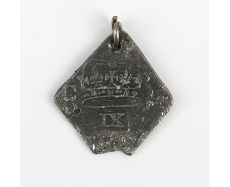 A British Newark siege nine pence, drilled with a jumper ring fitted, the lower corner chipped away, with the legend OBS NEWA