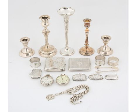 Silver items to include cigarette cases, vesta case, candle sticks, watches, double Albert watch chain, decanter labels