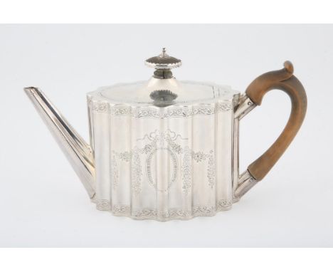 Victorian silver oval tea pot with fluted column body and bright cut decoration with blank cartouche, fruitwood handle and fi