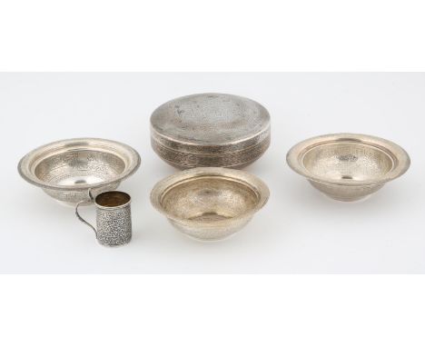 Egyptian silver covered bowl engraved with arabesques and script,14cm dia, three smaller Egyptian silver bowls .12.5cm dia. a