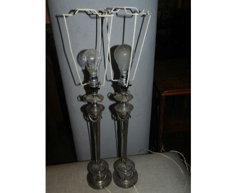 A pair of 19th century Sheffield silver plated lamp bases. H.46cm