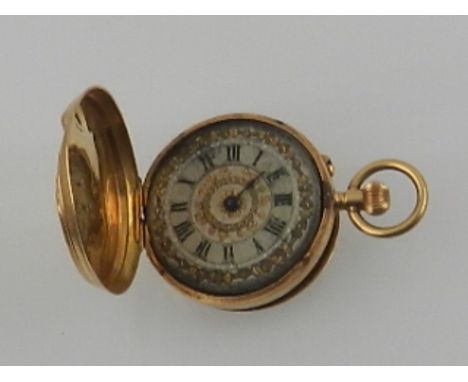 A late 19th century 18ct yellow gold hunter fob watch, with engine turned case enclosing a silvered Roman dial, set lever mov