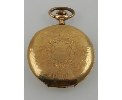 A late 19th century 18ct yellow gold hunter keyless pocket watch, having an engine turned case centred with a vacant cartouch