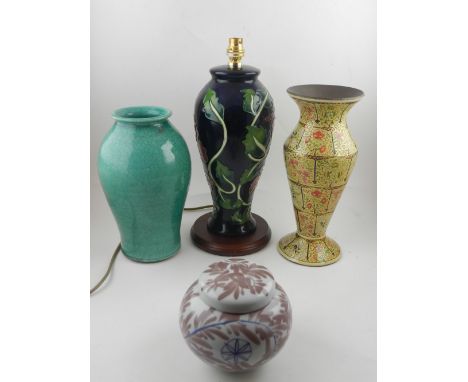 A Moorcroft style green crackle glazed vase, a Persian papier mache vase, and a Japanese ginger jar and cover.