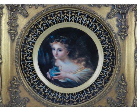 20th century Continental school, portrait of a girl on ceramic plate, mounted within an ornately carved giltwood and gesso fr