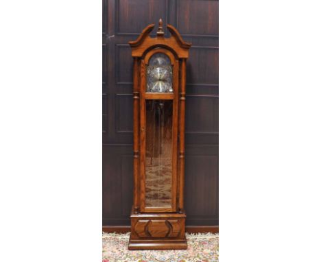 REPRODUCTION LONGCASE CLOCK
by Ridgeway, the unsigned weight driven movement striking on gongs, the silvered brass 9 inch dia