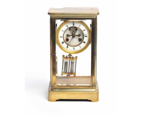 EARLY TWENTIETH CENTURY EIGHT DAY BRASS MANTEL CLOCK
retailed by Ducasse Claveau & Co., Paris, the signed two train eight day