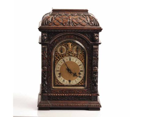VICTORIAN WINTERHALDER AND HOFMEIER CARVED OAK MANTEL CLOCK
retailed by D. Todd & Son, signed three train movement striking o