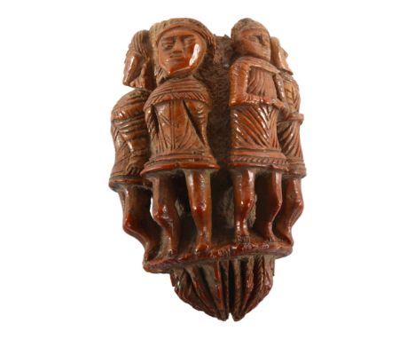 An 19th century nut flask with relief carved figures all round, length 6.5cm 