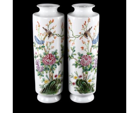 Pair of Chinese white glaze porcelain cylinder vases, with painted enamel birds and flowers, 4 character mark, height 33cmPer