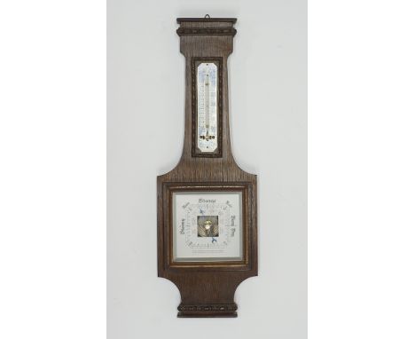 A vintage English stick Barometer with Thermometer above in an oak frame 51,5cm x 17cm, mid century.