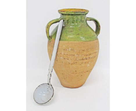 A Cypriot - Lapithos ceramic amphora pitcher, 'aleifta' the upper part glazed in green, the interior with clear glazing, used