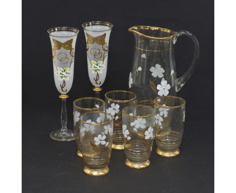 Vintage glasses. A set of Bohemian Lemonade pitcher and five glasses decorated with enamels and gilding together with a pair 