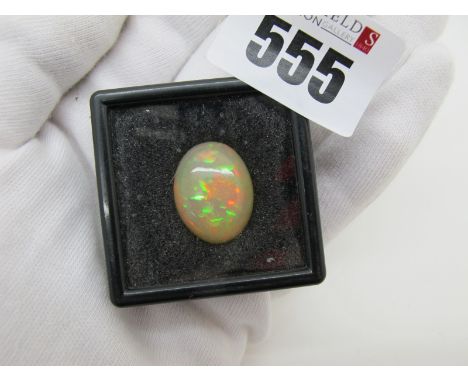 An Unmounted Oval Cabochon Opal, (21mm). 