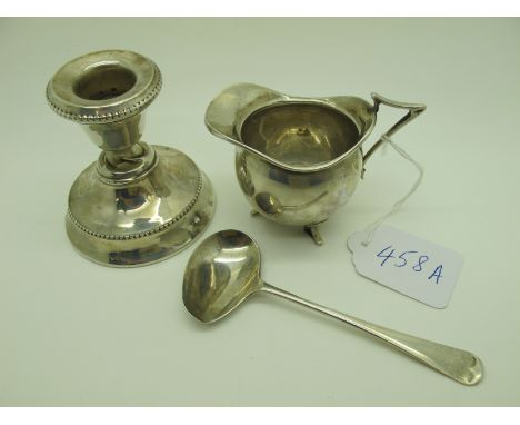 A Small Hallmarked Silver Jug, Birmingham 1911, with angular handle and feet; together with a hallmarked silver dwarf candles