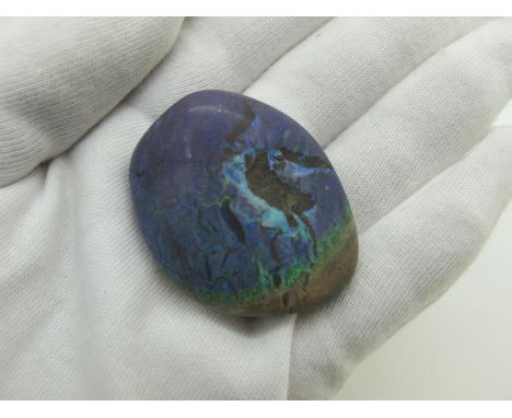 A Boulder Opal Matrix, polished. 