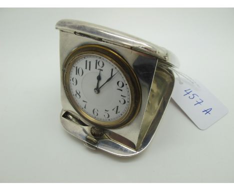 A Hallmarked Silver Cased Travel Clock, Grey &amp; Co, Chester 1912, the rounded rectangular case with engine turned decorati