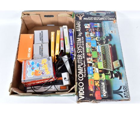 A BOXED ATARI 2600, BOXED ATARI 2600 GAMES AND A TELESPORT GAME CONSOLE, boxed games include Space Invaders, Frogger, Volleyb