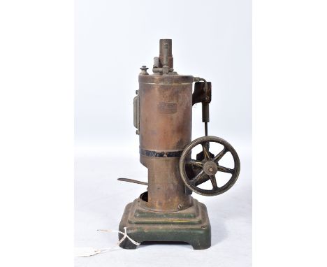 A MARKLIN VERTICAL LIVE STEAM BOILER, not tested, brass clad boiler driving a single 6cm diameter flywheel, with sight glass 