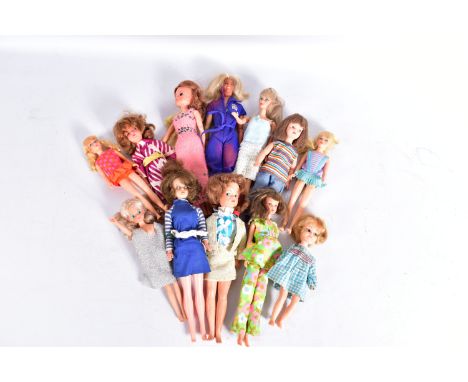 A COLLECTION OF 1960'S AND 1970'S DOLLS, to include two Pedigree Sindy dolls (one earlier version with painted lashes and sta