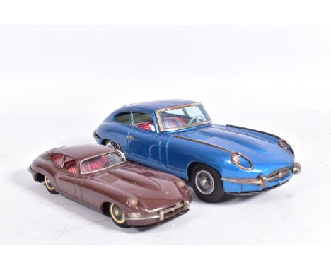 AN UNBOXED NOMURA TINPLATE FRICTION DRIVE JAGUAR E TYPE, metallic blue body, red and white interior, friction drive works int