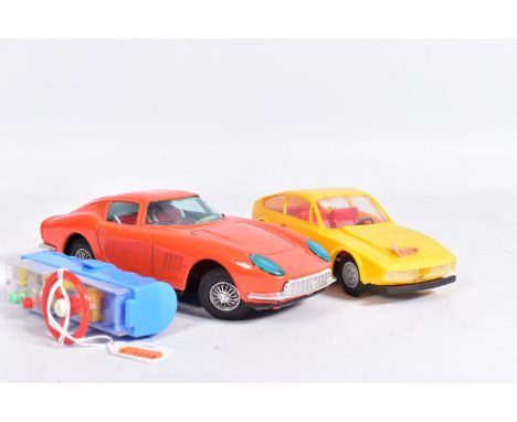 AN UNBOXED BANDAI TINPLATE BATTERY OPERATED FERRARI 275 GT, orange body, red, white and blue interior, not tested, playworn c