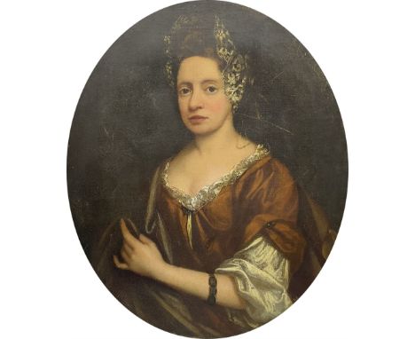 Irish School (18th century): Half length Portrait of a Lady wearing a Lace Bonnet, oval oil on canvas numbered '23', 74cm x 6