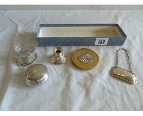 Silver miniature candle holder, decanter label, napkin ring, pill box and paperweight  