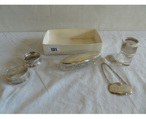 Silver rimmed glass boot match striker, napkin rings, decanter label, silver top cut glass pin box 