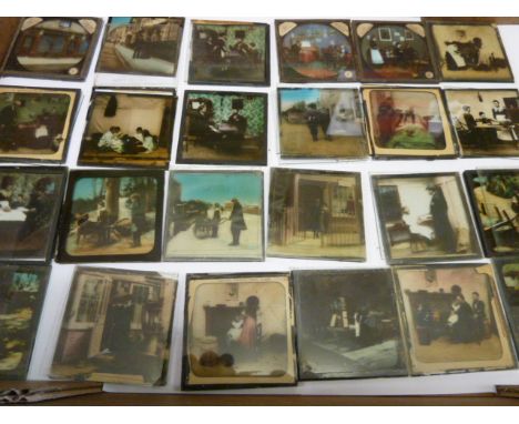 Early 20thC magic lantern slides depicting family life etc