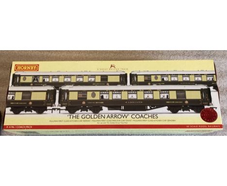 Hornby: A boxed Hornby, ‘The Golden Arrow’ Coaches pack Reference No. R4196. Unused in original packaging. Containing Pullman