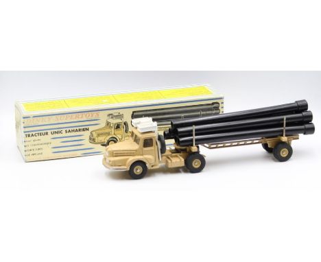 Dinky: A boxed French Dinky Toys, Tracteur Unic Saharien, Reference No. 893, tan cab and chassis with six black pipes. Origin