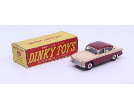 Dinky: A boxed Dinky Toys, Humber Hawk (with Windows), Reference No. 165, beige and maroon two-tone body, with silver hubs. O