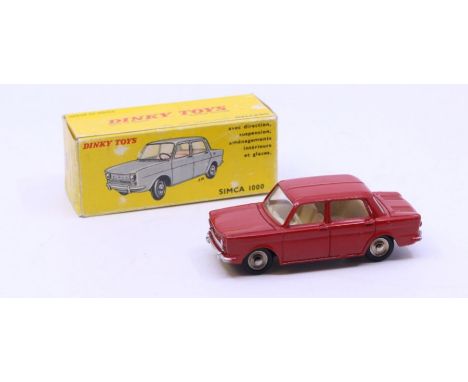 Dinky: A boxed French Dinky Toys, Simca 1000, Reference No. 519, red body with cream interior. Original box, general wear exp