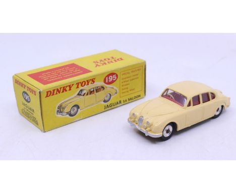 Dinky: A boxed Dinky Toys, Jaguar 3.4 Saloon, Reference No. 195, cream body with silver hubs. Original box, general wear expe